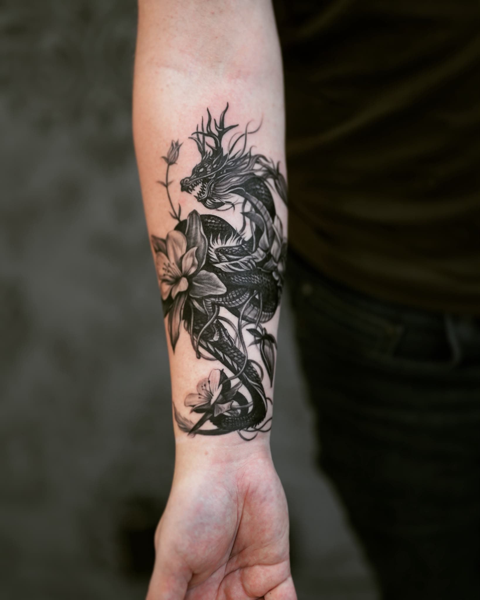 Drachen-Motiv am Unterarm